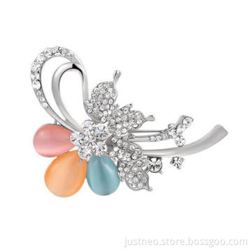 women brooch, copper alloy plated with white/rose gold